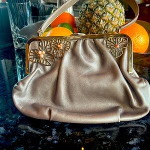 A Cartier evening Santos metallic handbag